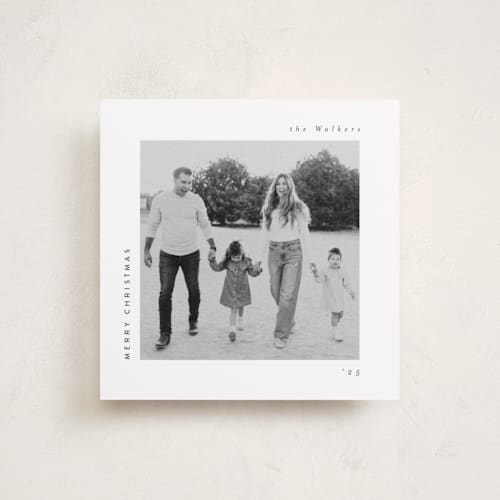 This is a charcoal holiday photo cards with standard by Lucrecia Caporale called merry & minimal style printing on recycled smooth signature in standard