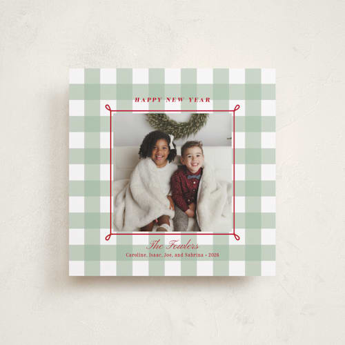 This is a holly berry holiday photo cards with standard by Alston Foster called festive gingham plaid printing on recycled smooth signature in square