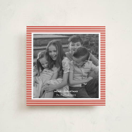 This is a ruby holiday photo cards with standard by Annie Shapiro called spirit printing on recycled smooth signature in square