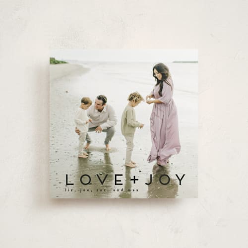 This is a coal holiday photo cards with standard by Kate Ross called love joy printing on recycled smooth signature in standard