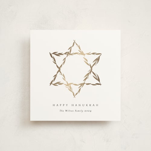 This is a ink hanukkah cards with foil pressed by Becky Nimoy called star of leaves printing on signature in standard