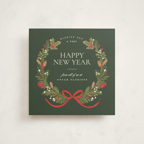 This is a pine holiday photo cards with standard by Creo Study called holiday wreath printing on signature in square