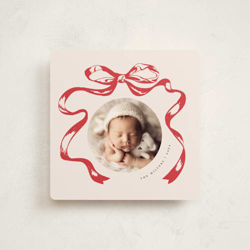This is a santa suit babys first christmas with standard by Teju Reval called big vintage bow printing on recycled smooth signature in standard