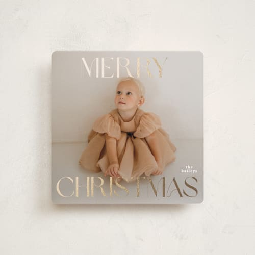 This is a snowflake foil pressed holiday cards with foil pressed by Angela Thompson called merry squary printing on recycled smooth signature in standard