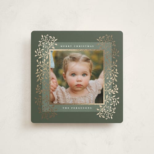This is a sage foil pressed holiday cards with foil pressed by Tamara Hilje called laurel printing on recycled smooth signature in square