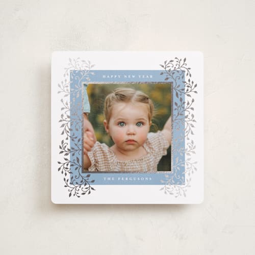 This is a frosted foil pressed holiday cards with foil pressed by Tamara Hilje called laurel printing on recycled smooth signature in square