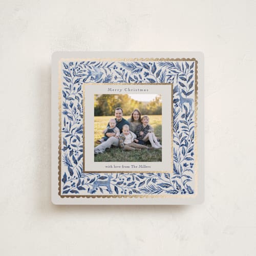 This is a porcelain foil pressed holiday cards with foil pressed by Elly called a peaceful winter printing on recycled smooth signature in standard