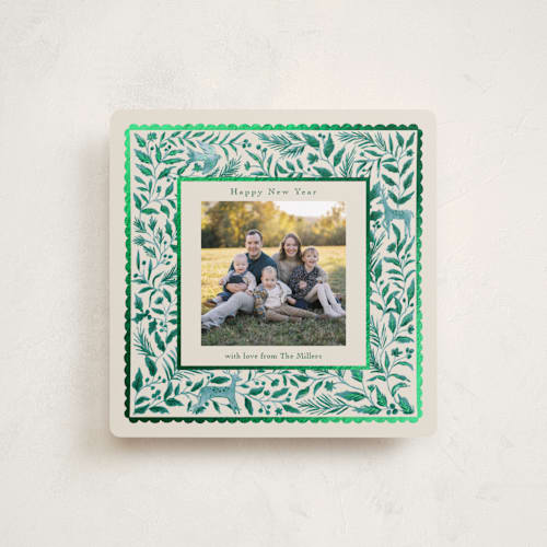 This is a emerald foil pressed holiday cards with foil pressed by Elly called a peaceful winter printing on recycled smooth signature in square