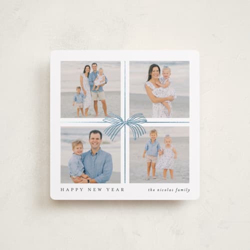 This is a night foil pressed holiday cards with foil pressed by Brooke Chandler called square present printing on recycled smooth signature in square