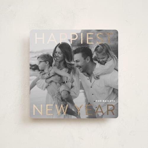 This is a snowfall foil pressed holiday cards with foil pressed by Angela Thompson called gilded type printing on recycled smooth signature in square