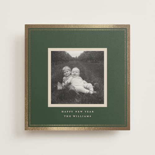 This is a pine photo mount holiday cards with foil pressed by Robert and Stella called christmas keepsake printing on recycled in photo_mount