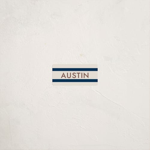 This is a navy name labels with standard by Megan Davis called montauk printing on waterproof sticker paper in sticker