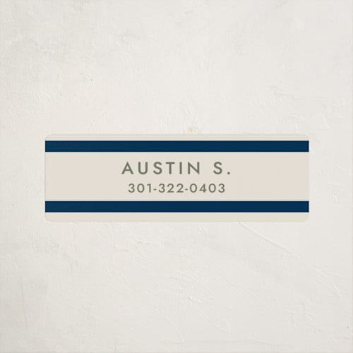 This is a navy name labels with standard by Megan Davis called montauk printing on waterproof sticker paper in sticker