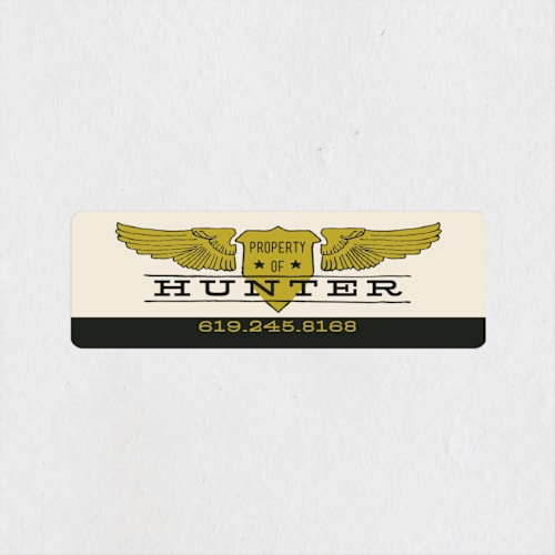 This is a golden name labels with standard by Shiny Penny Studio called wings badge printing on waterproof sticker paper in sticker