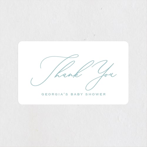 This is a powder blue baby shower favor labels with standard by Carolyn MacLaren called crib bows printing on uncoated sticker paper in sticker