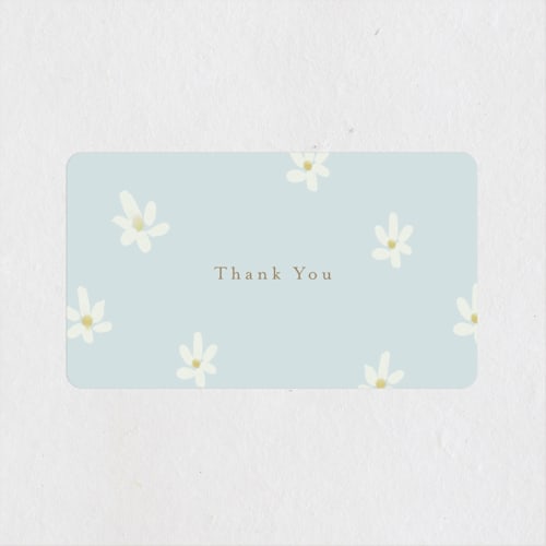 This is a baby blue baby shower favor labels with standard by Ani Somi called daisies printing on uncoated sticker paper in sticker