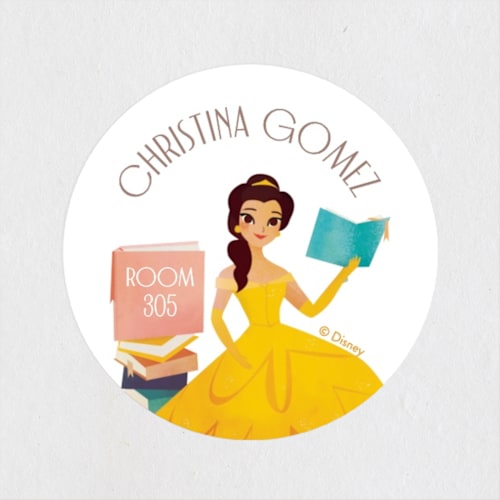 This is a golden yellow name labels with standard by Lori Wemple called storytime with belle from disney's beauty and the beast printing on waterproof sticker paper in sticker