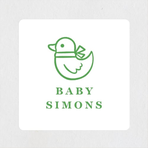 This is a lawn baby shower favor labels with standard by mo kelley called stork crest printing on uncoated sticker paper in sticker