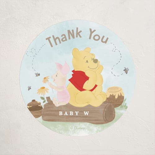 This is a sky baby shower favor labels with standard by Creo Study called disney's winnie the pooh a little hunny printing on uncoated sticker paper in sticker