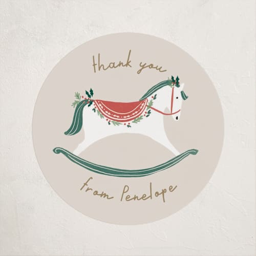 This is a eggnog baby shower favor labels with standard by Rebecca Durflinger called festive rocking horse printing on uncoated sticker paper in sticker