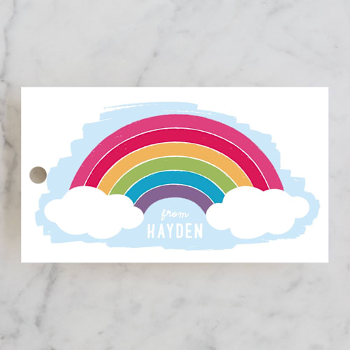 This is a rainbow kids gift tags with standard by Hooray Creative called joyful rainbow printing on signature in tag