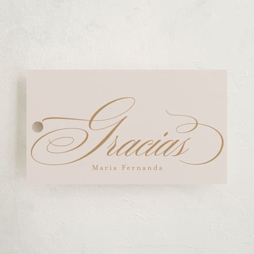 This is a cream kids gift tags with standard by Tamara Hilje called gilded printing on signature in tag