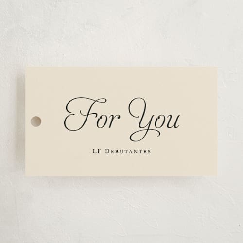 This is a cream party favor tags with standard by Ani Somi called calling card printing on signature in tag