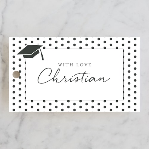 This is a snow graduation tags with standard by Deynaaz Daraei called patchwork printing on signature in tag