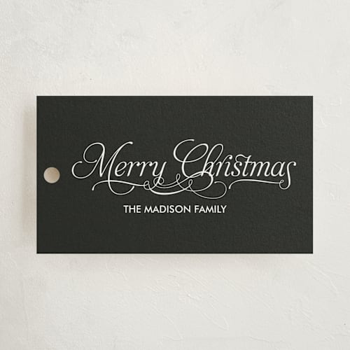 This is a black gift tags with standard by Nam Bourassa called modern elegance printing on signature in tag