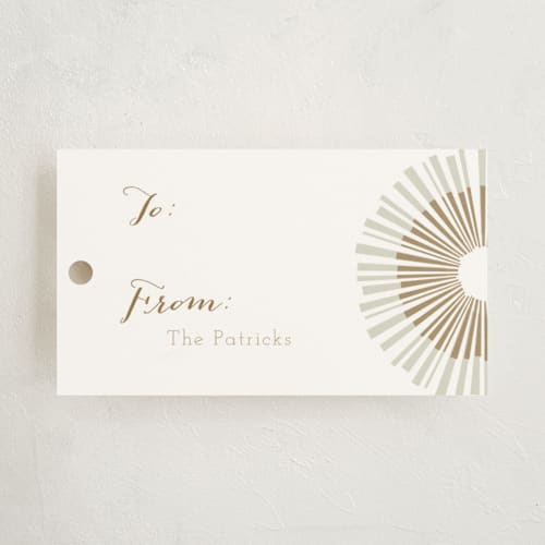 This is a golden gift tags with standard by Kelly Ventura called shimmer printing on signature in tag