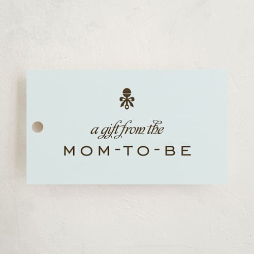 This is a cornflower gift tags with standard by Robin Ott called petite rattle printing on signature in tag