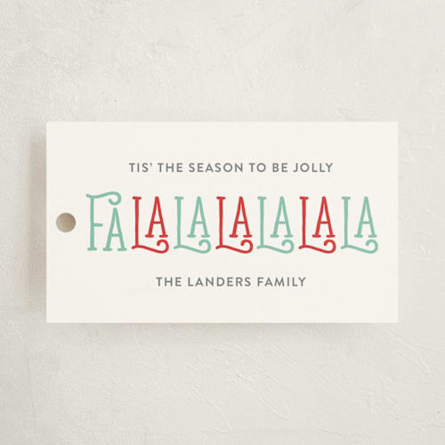 This is a frost gift tags with standard by Dennis Smith called falalalalalala printing on signature in tag