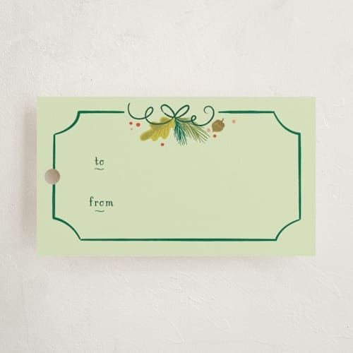 This is a forest gift tags by Ariel Rutland called woodland christmas printing on signature in tag