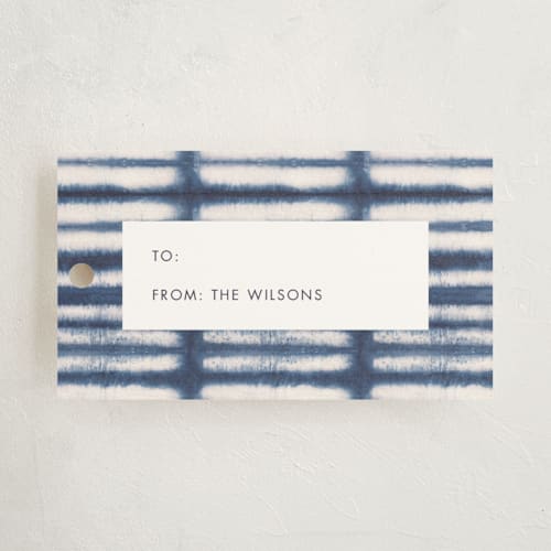 This is a navy gift tags by Creo Study called shibori lines printing on recycled in tag