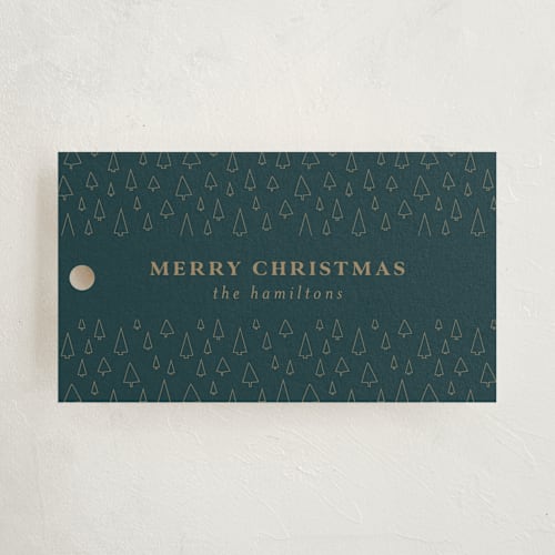 This is a dark teal gift tags with standard by Iveta Angelova called outlined forest 1 printing on signature in tag