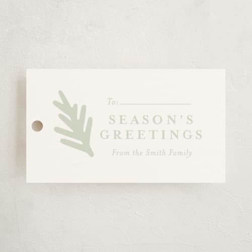 This is a pine gift tags by Meggy Masters called winter pine printing on signature in tag