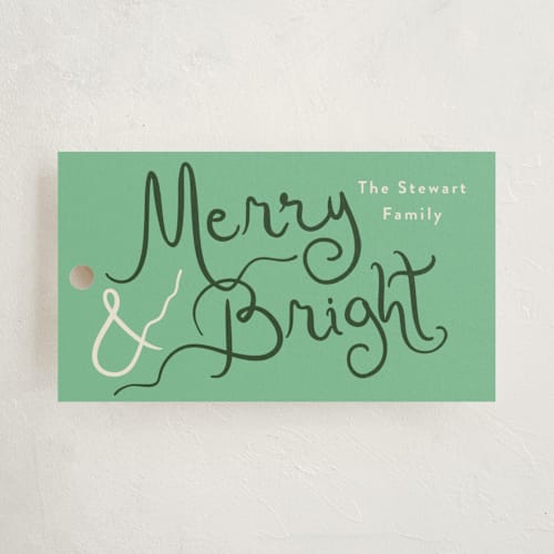 This is a fir gift tags by Megan Davis called winter bright printing on signature in tag