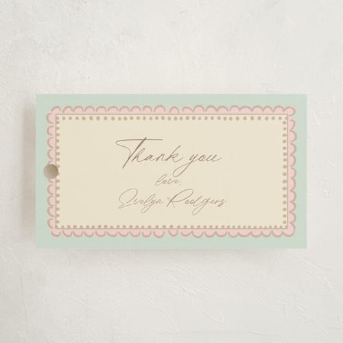 This is a mint baby shower favor tags with standard by Tina Faselli called precious printing on signature in tag