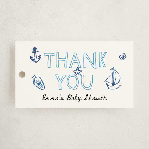 This is a denim baby shower favor tags with standard by Cass Loh called nautical doodles printing on signature in tag