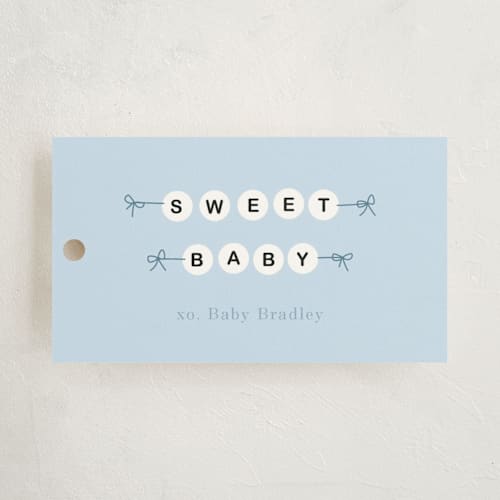 This is a aqua baby shower favor tags with standard by Baumbirdy called mom era printing on signature in tag
