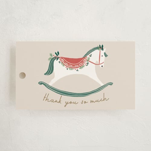 This is a eggnog baby shower favor tags with standard by Rebecca Durflinger called festive rocking horse printing on signature in tag