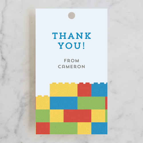 This is a cobalt kids gift tags with standard by Belia Simm called master builders party printing on signature in tag