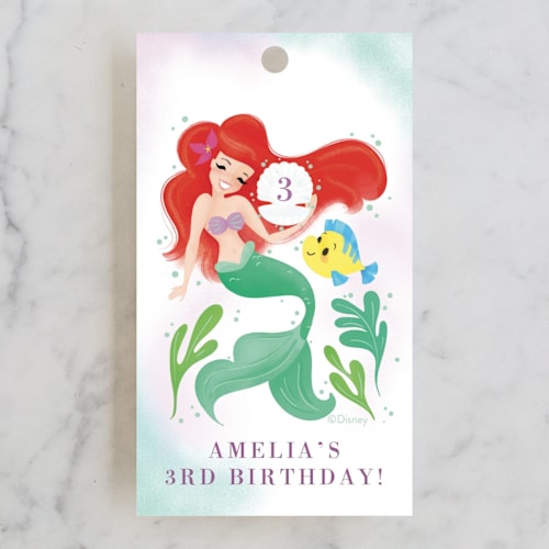 This is a lilac kids gift tags with standard by Itsy Belle Studio called disney's little mermaid shellebrate! printing on signature in tag