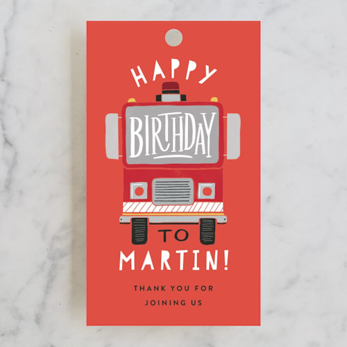 This is a poinsettia kids gift tags with standard by Alethea and Ruth called sound the alarm firetruck printing on signature in tag