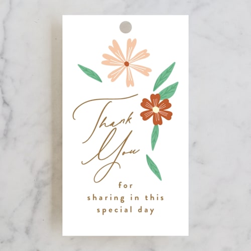 This is a peach kids gift tags with standard by Phrosné Barwood called blooms printing on signature in tag