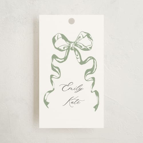 This is a mint kids gift tags with standard by Teju Reval called big bow printing on signature in tag