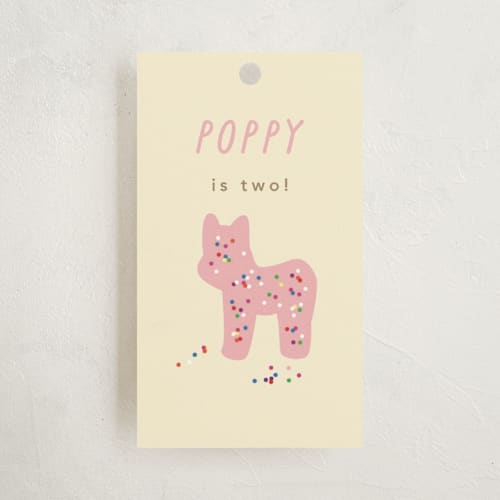 This is a pink sugar kids gift tags with standard by Jennifer Postorino called animal cracker parade printing on signature in tag