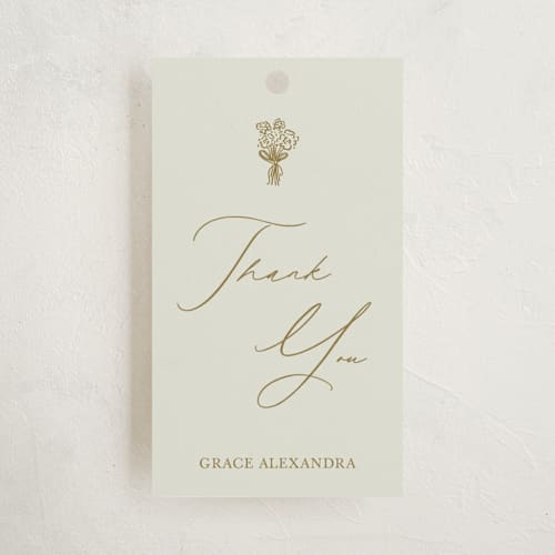 This is a marigold party favor tags with standard by Stephanie Heinrich Godbout called modern elegance printing on signature in tag