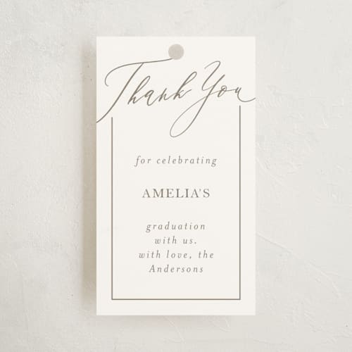 This is a latte graduation tags with standard by Deynaaz Daraei called carlisle printing on signature in tag