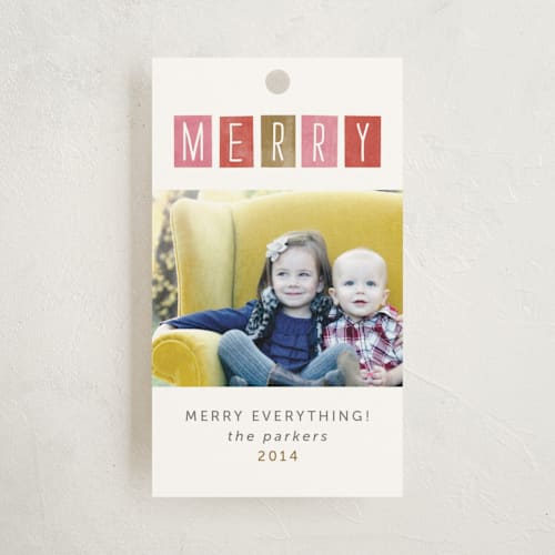 This is a strawberry gift tags by Sara Hicks Malone called just merry printing on signature in tag